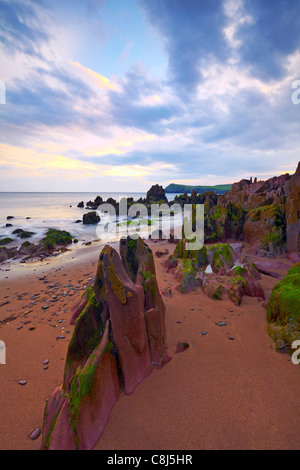 Costa frastagliata al tramonto sulla penisola di Dingle, Co.Kerry, Irlanda Foto Stock