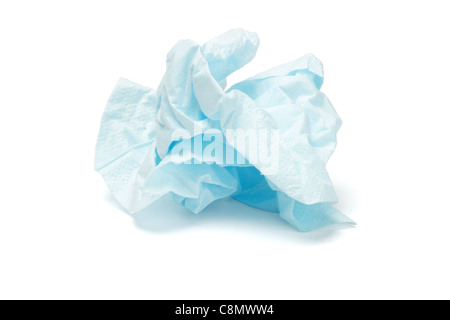 Crumpled blue facial tissue carta su sfondo bianco Foto Stock