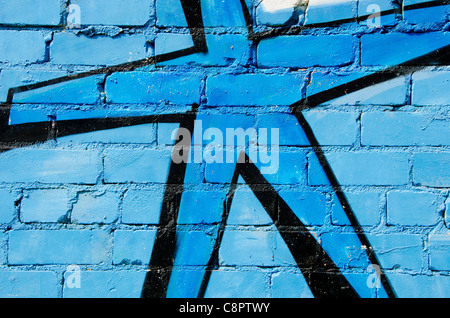 Dipinto di blur e muro nero lo sfondo di mattoni Foto Stock