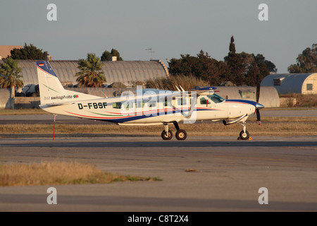Cessna 208B Grand Caravan aeromobile a motore singolo gestito da Swisphoto Foto Stock