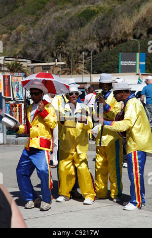 Una banda di Calypso sulla banchina a Hout Bay sulla costa vicino a Cape Town. Foto Stock