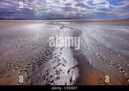 Modelli di marea sulla sabbia a Titchwell Beach durante le tempeste Norfolk Foto Stock