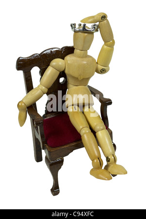 Leadership sventure rappresentato da un re in trono con la sua mano sulla sua corona - percorso incluso Foto Stock