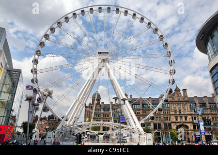 La ruota di Manchester in Exchange Square, Manchester, Inghilterra Foto Stock