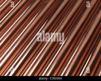 Plumbing lucido di tubi di rame abstract background artistico Foto Stock