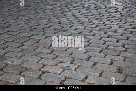 Grigio pavimentazione in ciottoli, texture di sfondo. Foto Stock