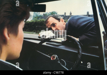 In senso orario Anno: 1986 - Direttore del Regno Unito: Christopher Morahan John Cleese, Sharon Maiden Foto Stock