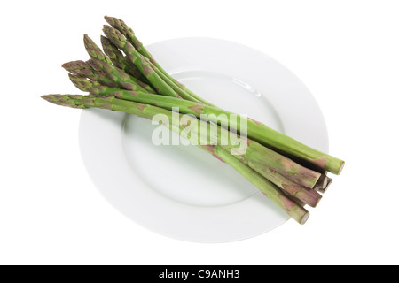 Gli asparagi sulla piastra Foto Stock