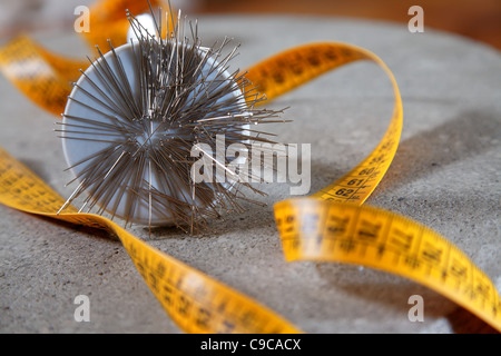 Metro a nastro e spine Foto Stock