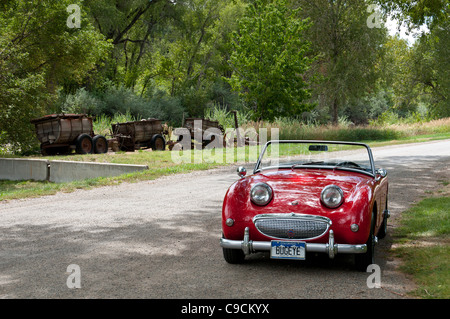 Austin Healey Sprite a valle Orchard Farm e Ponte nero cantina, Paonia, Colorado. Foto Stock