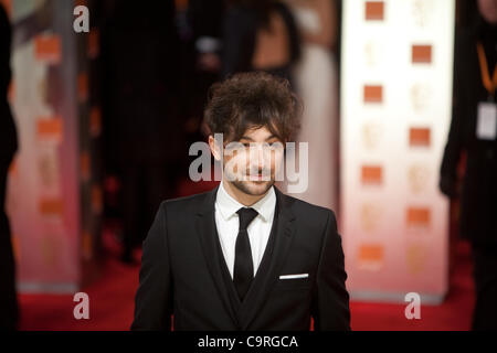 Londra, UK, 12/02/2012. Attore Alex Zane, arrivando al 2012 BAFTAs Foto Stock