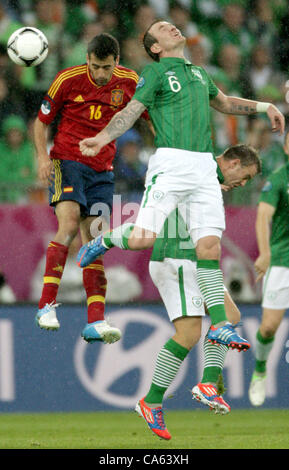 14.06.2012, Gdansk, Polonia. Spagna Sergio Busquets e dell'Irlanda Glenn Whelan (R) sfida per la sfera durante UEFA EURO 2012 gruppo C partita di calcio Spagna vs Italia a Arena Danzica Danzica, Polonia, 14 giugno 2012. Foto Stock