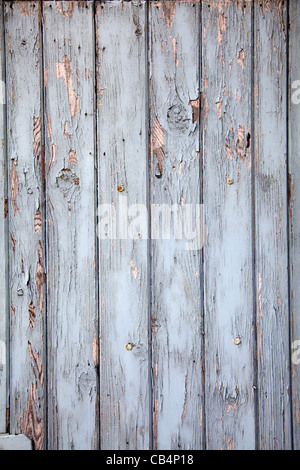 La pelatura di vernice sulla porta di legno Foto Stock