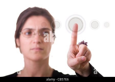 Una imprenditrice premendo un hi-tech pulsante (potete scrivere il vostro comando sul pulsante: login, immettere, start, sì, no ...) Foto Stock