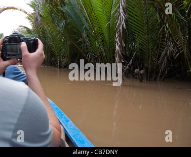 I turisti in viaggio sul fiume Mekong, Delta del Mekong, Vietnam Foto Stock