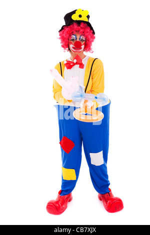 Funny clown in piedi su sfondo bianco Foto Stock