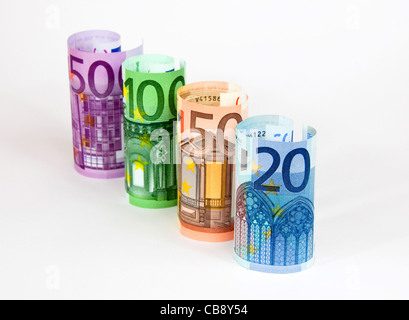 Arrotolate le banconote in euro. Foto Stock