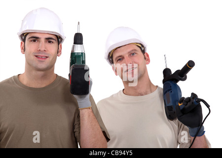 Due artigiano con trapani. Foto Stock