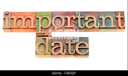 Data importante - testo isolato in legno vintage tipografia blocchi Foto Stock