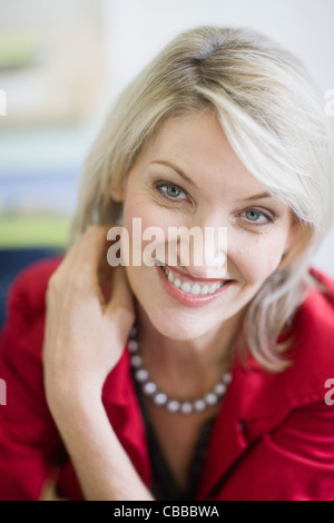 Close up imprenditrice il volto sorridente Foto Stock