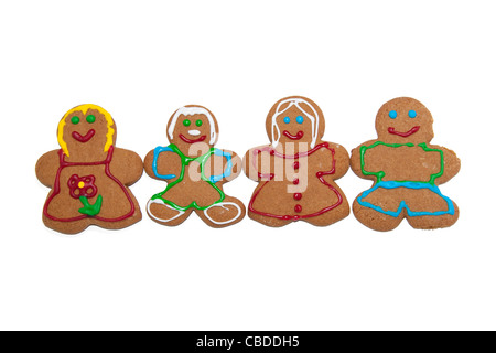 Colorata e sorridente gingerbread uomini e donne su sfondo bianco Foto Stock