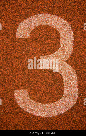Colore bianco numero di cifre su rosso Foto Stock