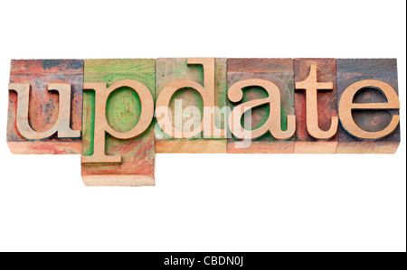 Aggiornamento - parola isolata in legno vintage tipografia blocchi Foto Stock