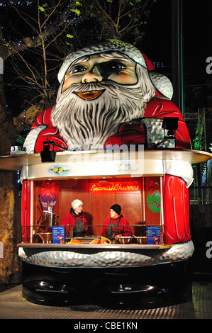 Babbo Natale Spagnolo di stallo churros al mercato di Natale, Rembrandtplein, Amsterdam, Olanda settentrionale, il Regno dei Paesi Bassi Foto Stock