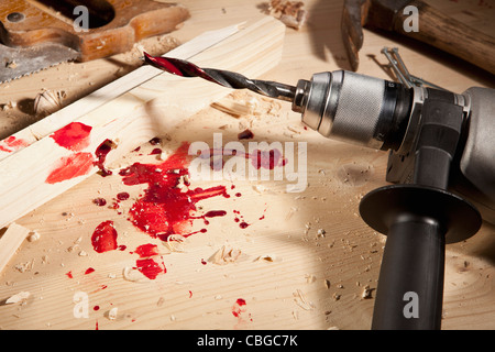 Un trapano con il sangue su di esso Foto Stock