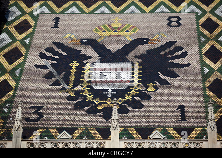 Double-headed eagle sul tetto della Cattedrale di St Stephen, Vienna Foto Stock