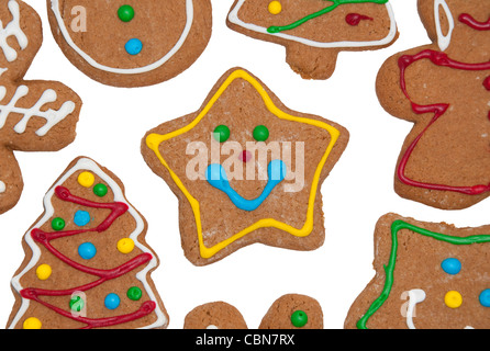 Colorato gingerbread cookie su bianco Foto Stock
