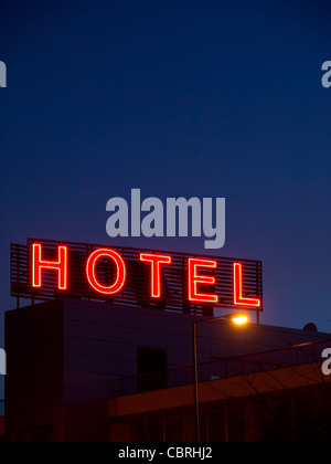 Hotel insegna al neon di notte Foto Stock