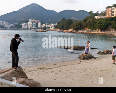 dh St Stephens Beach STANLEY HONG KONG fotografo coppie cinesi matrimonio fotografie spiaggia di sabbia coppia Foto Stock