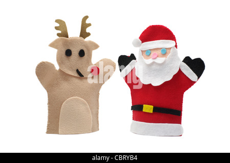 Babbo Natale e renne sentivano marionette a mano su sfondo bianco, rappresentando i personaggi natalizi per le feste o per giocare. Foto Stock