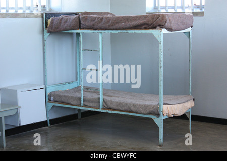 Un dormitorio cella di Robben Island prigione, Cape Town, Sud Africa Foto Stock