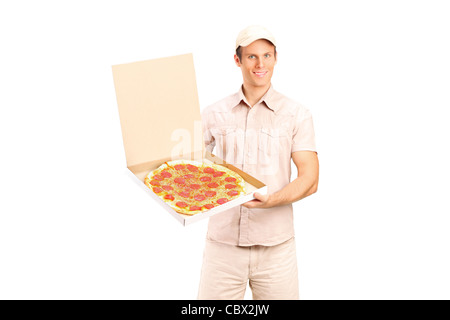 Ragazzo delle consegne tenendo un pizza Foto Stock