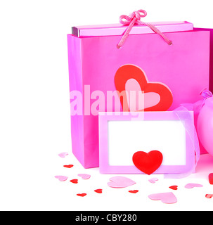 Rosa shopping bag con dono & carta vergine, isolato su sfondo bianco, Immagine concettuale di amore & vacanza di San Valentino Foto Stock