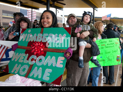 Benvenuti a casa vostra cerimonia per la guerra in Iraq i veterani di ritorno dal dovere di Fort Hood in Texas. Le famiglie sono arrivati a salutare i loro cari Foto Stock