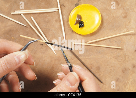 La raccolta: negozi di antiquariato in miniatura Shop rendendo bastoni Foto Stock