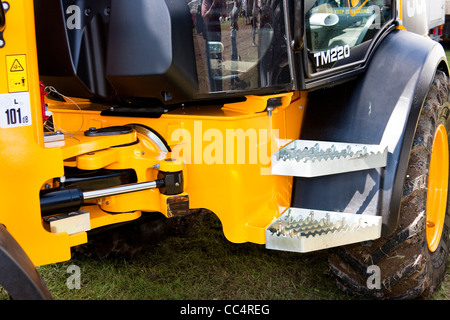 Giallo escavatore idraulico meccanismo di articolazione Vista laterale Foto Stock