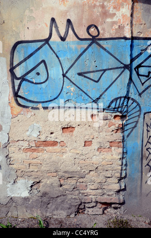 Il vecchio muro urbano e sfondo grafitti e texture Foto Stock
