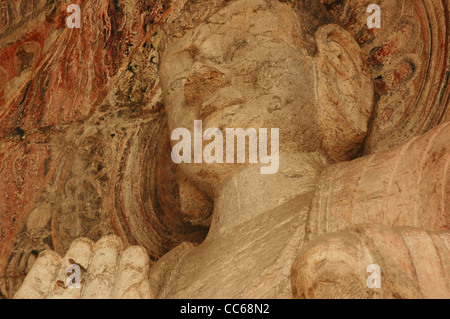 Sakyamuni statua, le Grotte di Longmen, Luoyang, Henan , Cina Foto Stock