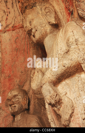 Statua del Buddha, le Grotte di Longmen, Luoyang, Henan , Cina Foto Stock