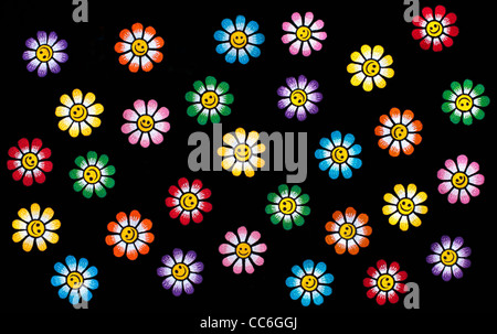 Ferro da ricamo sulle patch di variopinte Smiley face fiori su sfondo nero Foto Stock