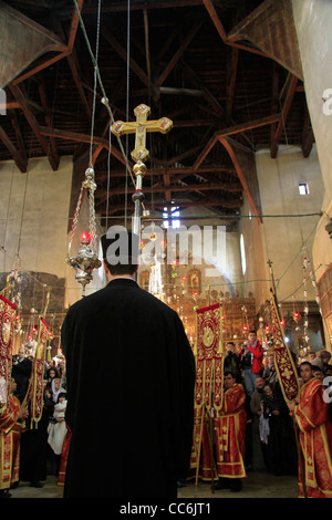 Il Natale a Betlemme, greci ortodossi cerimonia presso la chiesa della Natività Foto Stock