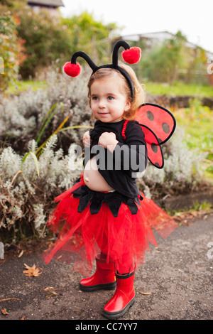 Ragazza Dressed-Up come Ladybug, Portland, Multnomah County, Oregon, Stati Uniti d'America Foto Stock