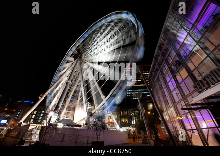 La ruota del pubblico di Manchester ruota panoramica Ferris in Exchange Square. Foto Stock