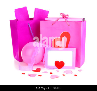 Rosa shopping bags con dei regali & carta vergine, isolato su sfondo bianco, Immagine concettuale di amore & vacanza di San Valentino Foto Stock