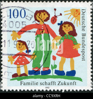 Germania - circa 1992: un timbro stampato in Germania, mostra la famiglia, circa 1992 Foto Stock
