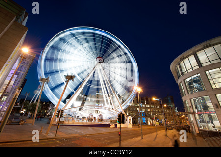 La ruota del pubblico di Manchester ruota panoramica Ferris in Exchange Square. Foto Stock
